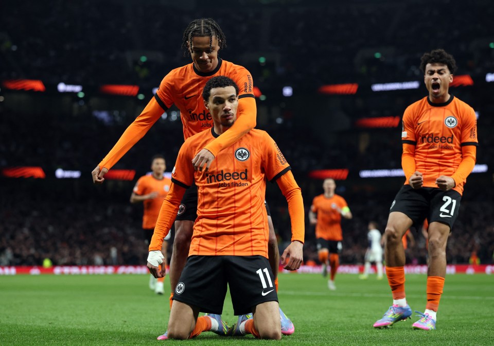 Eintracht Frankfurt's Hugo Ekitike celebrates a goal with teammates.