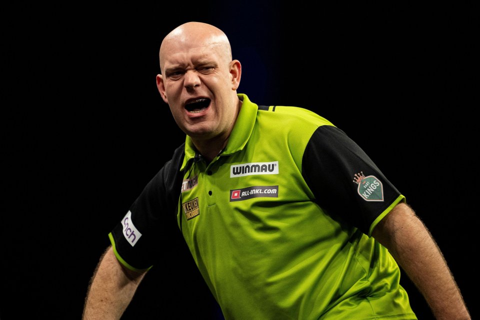 Michael van Gerwen celebrating at a darts match.
