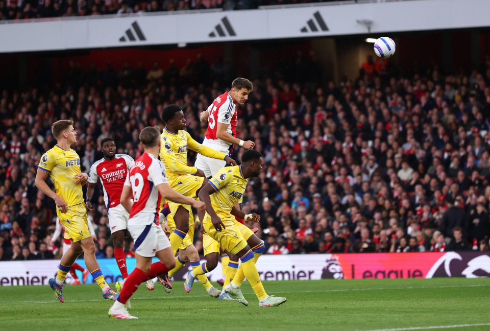 Jakub Kiwior of Arsenal scoring a goal during a Premier League match.