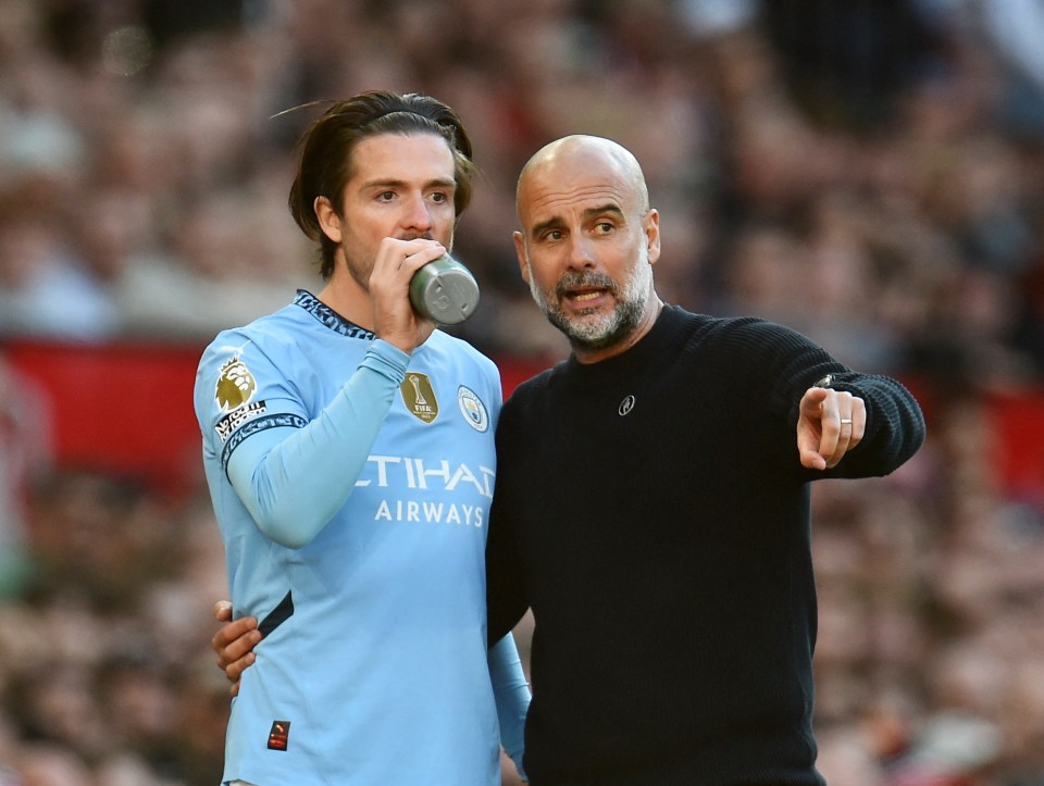 Pep Guardiola and Jack Grealish of Manchester City.