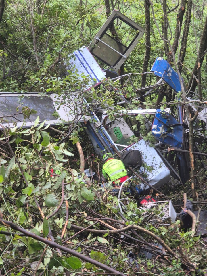 Rescuers at the scene of a cable car crash.
