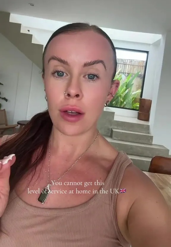 Woman in a villa discussing the level of service she receives.