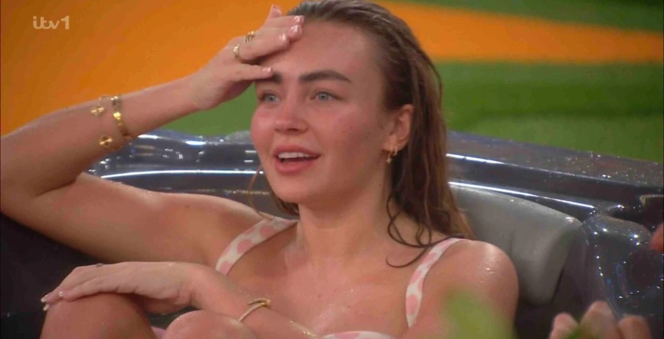 Ella Rae Wise in a hot tub.