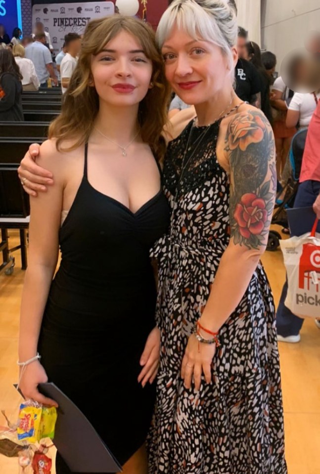 Teenage girl and her mother at a graduation ceremony.
