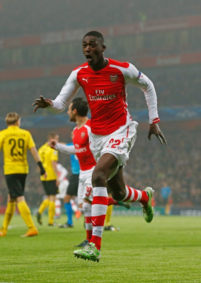 LONDON, ENGLAND - NOVEMBER 26:  Yaya Sanogo of Arsenal celebrates after scoring the opening goal during the UEFA Champions League Group D match between Arsenal and Borussia Dortmund at the Emirates Stadium on November 26, 2014 in London, United Kingdom.  (Photo by Clive Rose/Getty Images)