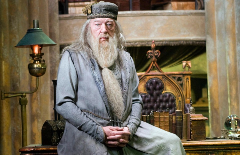 Albus Dumbledore sitting at a desk.