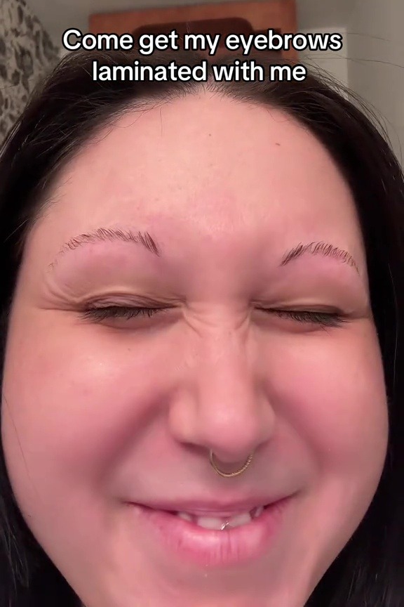 Close-up of a person's face with laminated eyebrows.
