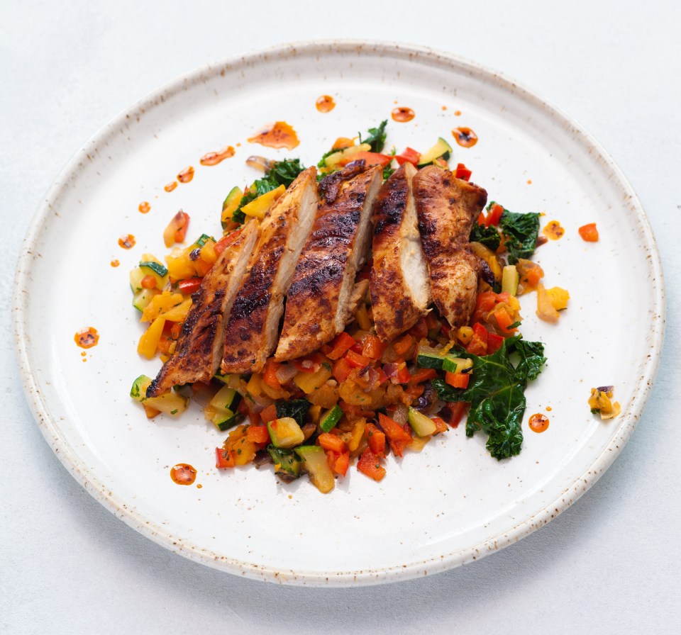 Grilled chicken breast with roasted vegetables.