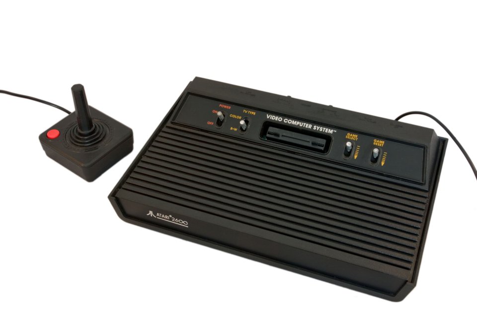 Original model Atari VCS 2600 Video Computer System plus original black joystick with bright red button Photographer Colin Woodbridge Credit Colin Woodbridge / Alamy