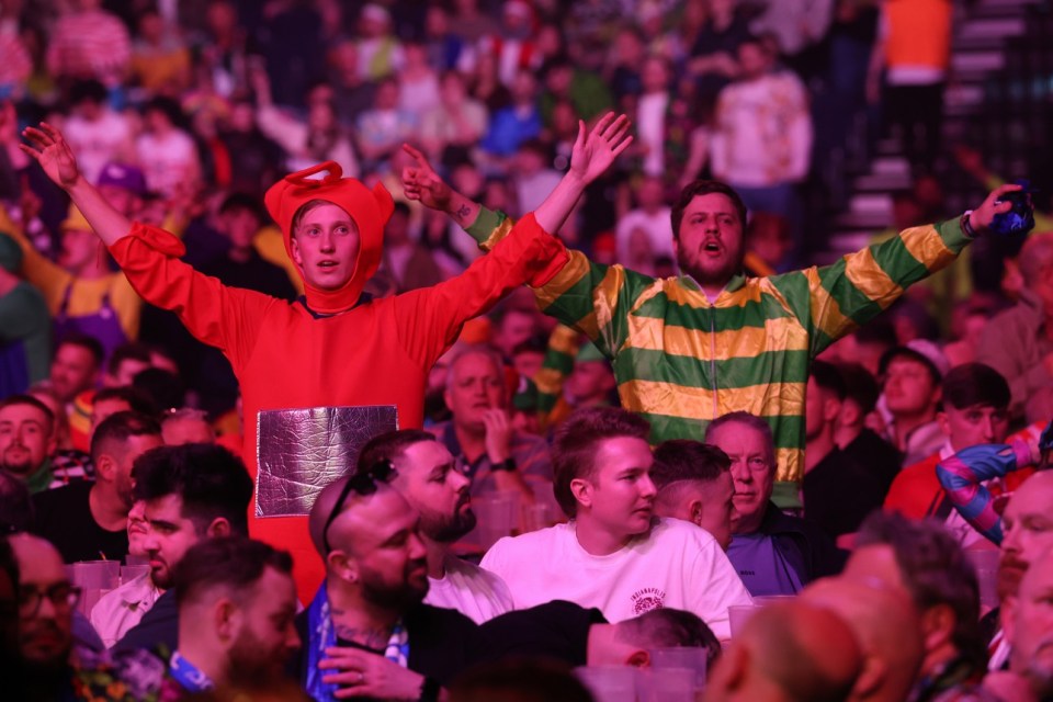 CARDIFF, WALES - MARCH 20: Supporters in full voice during the BetMGM Premier League Darts Night Seven at Utilita Arena Cardiff on March 20, 2025 in Cardiff, Wales. (Photo by Michael Steele/Getty Images)