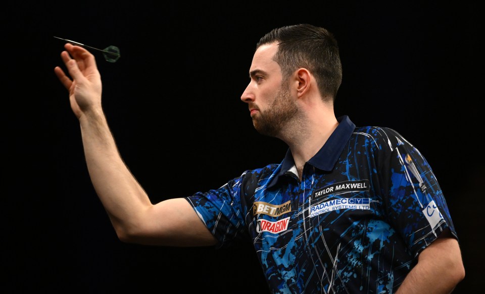 NEWCASTLE UPON TYNE, ENGLAND - MARCH 27: Luke Humphries in action during his quarter final match against Chris Dobey during the 2025 BetMGM Premier League Darts event at Utilita Arena on March 27, 2025 in Newcastle upon Tyne, England. (Photo by Stu Forster/Getty Images)