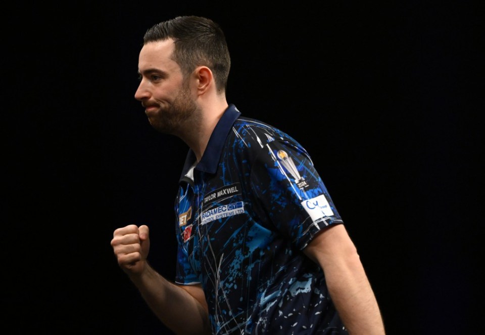 NEWCASTLE UPON TYNE, ENGLAND - MARCH 27: Luke Humphries celebrates after winning his semi final against Nathan Aspinall during the 2025 BetMGM Premier League Darts event at Utilita Arena on March 27, 2025 in Newcastle upon Tyne, England. (Photo by Stu Forster/Getty Images)