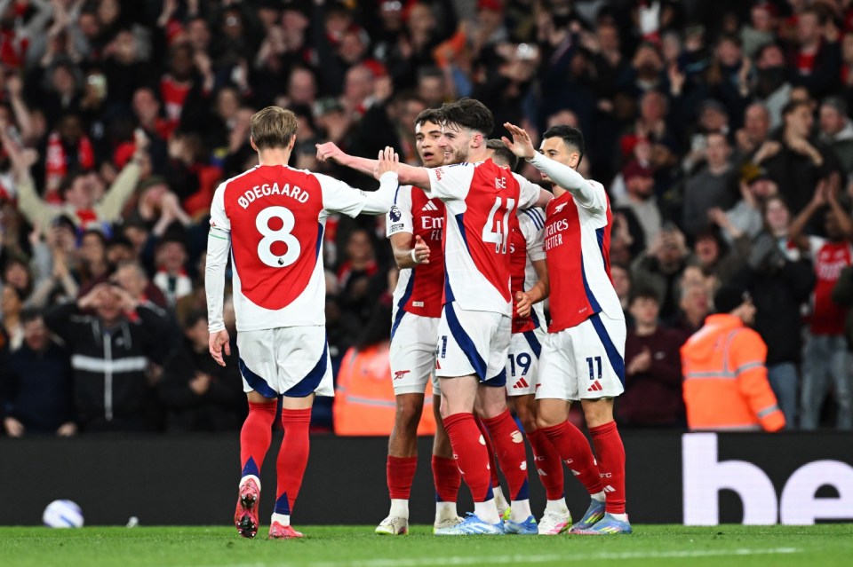 LONDON, ENGLAND - APRIL 23: Leandro Trossard of Arsenal (obscured) celebrates scoring his team's second goal with teammates during the Premier League match between Arsenal FC and Crystal Palace FC at Emirates Stadium on April 23, 2025 in London, England. (Photo by Stuart MacFarlane/Arsenal FC via Getty Images)