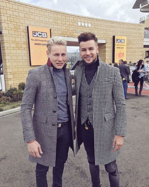 Chris Hughes and his brother Ben at a race track.