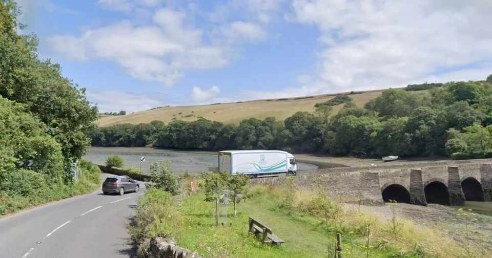 A379 near Kingsbridge, a truck on a stone bridge over a river.