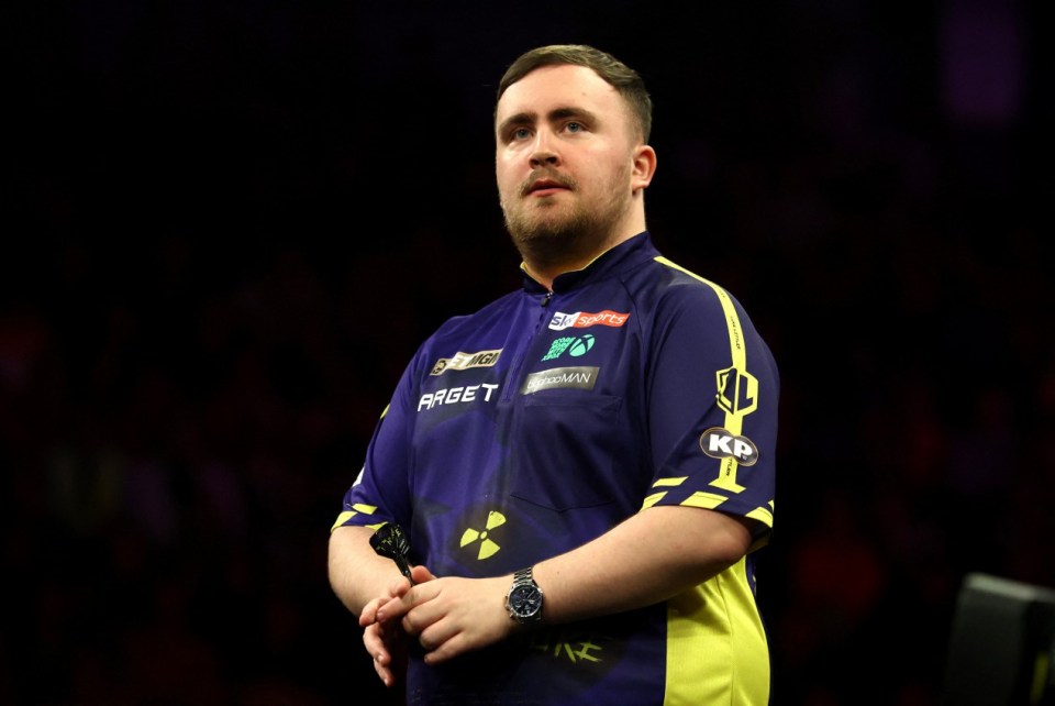 Darts - 2025 Premier League - Newcastle - Utilita Arena, Newcastle, Britain - March 27, 2025 Luke Littler reacts during his semi final match against Rob Cross REUTERS/Lee Smith