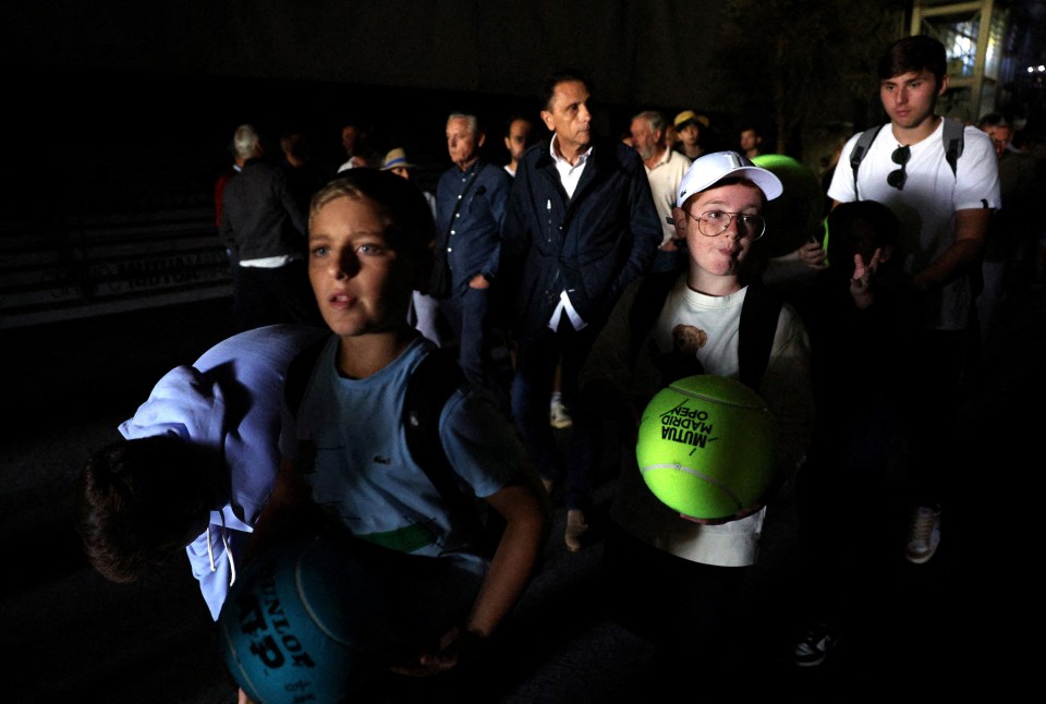 Tennis - Madrid Open - Park Manzanares, Madrid, Spain - April 28, 2025 Fans are seen after the matches get suspended due to a power outage REUTERS/Violeta Santos Moura TPX IMAGES OF THE DAY
