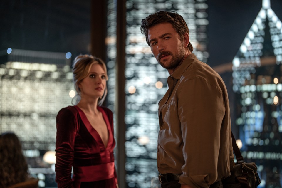 Film still of Meghann Fahy and Brandon Sklenar in *Drop*.