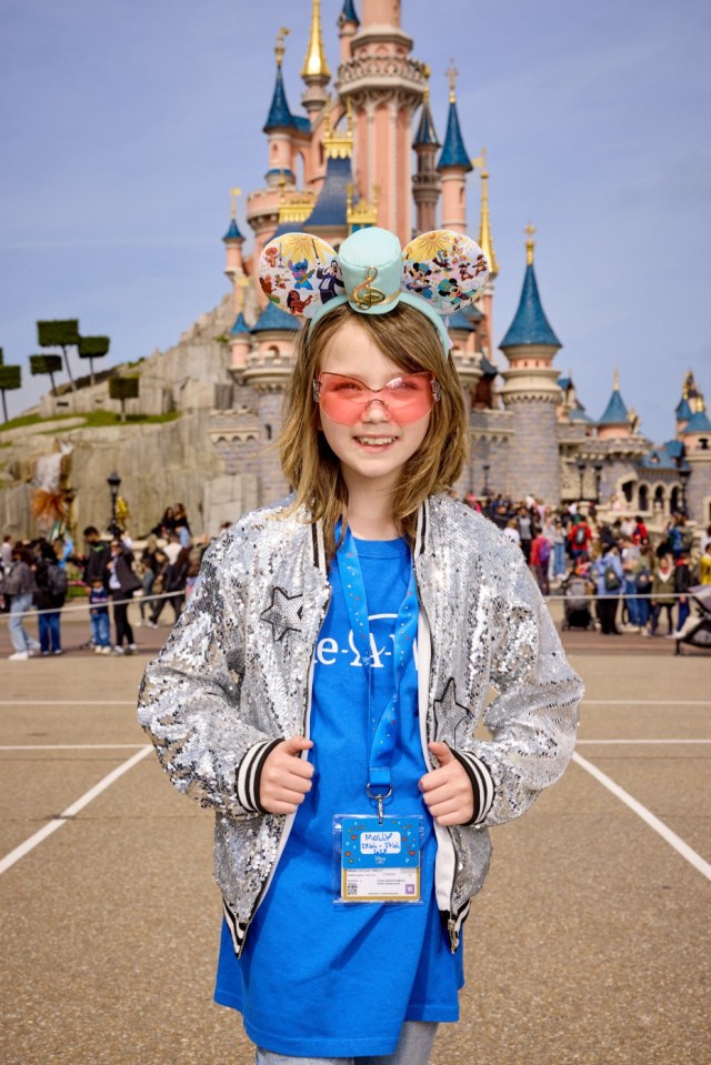 Undated handout photo issued by Disneyland Paris of Molly Townsend-Blazier, 9, from Kent, at the launch of the Disney Music Festival at Disneyland Paris ahead of performing with Sam Ryder. The Eurovision star has said "one of the most meaningful and heartwarming things I've ever done" has been singing with critically ill children at Disneyland Paris. Issue date: Saturday April 26, 2025. PA Photo. See PA story SHOWBIZ Ryder. Photo credit should read: Daniel Kennedy/Disneyland Paris/PA Wire NOTE TO EDITORS: This handout photo may only be used for editorial reporting purposes for the contemporaneous illustration of events, things or the people in the image or facts mentioned in the caption. Reuse of the picture may require further permission from the copyright holder.