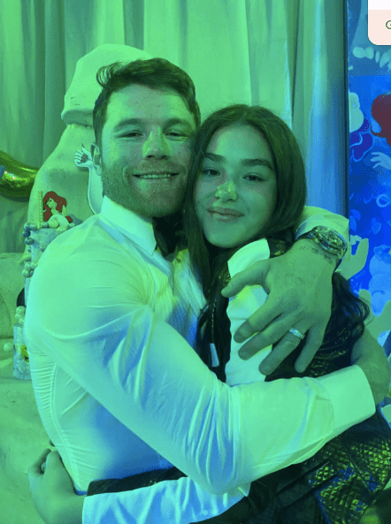 A man and woman embracing.