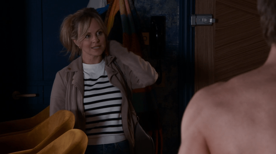 Screenshot of a woman in a striped shirt talking to a shirtless man.