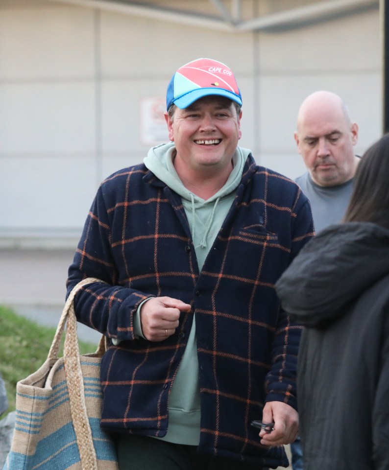 Alan Carr arriving at Inverness airport.