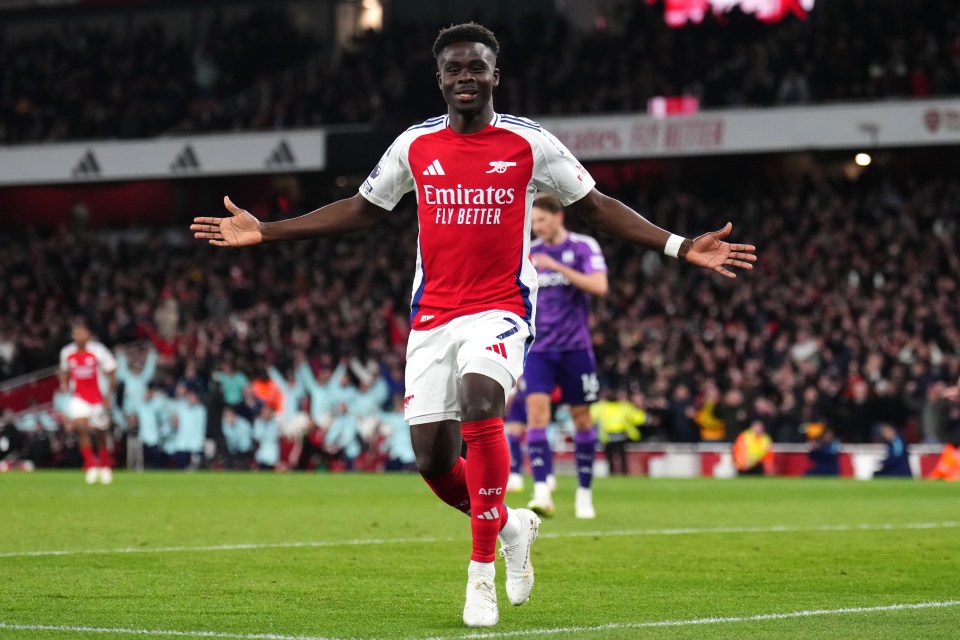 Bukayo Saka celebrating a goal.
