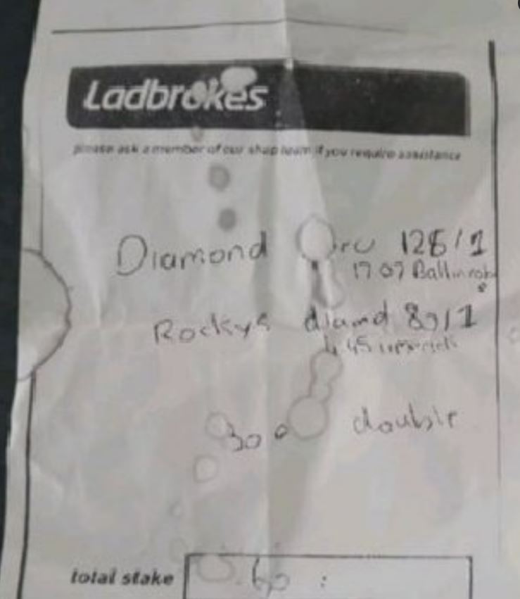 Handwritten Ladbrokes betting slip.
