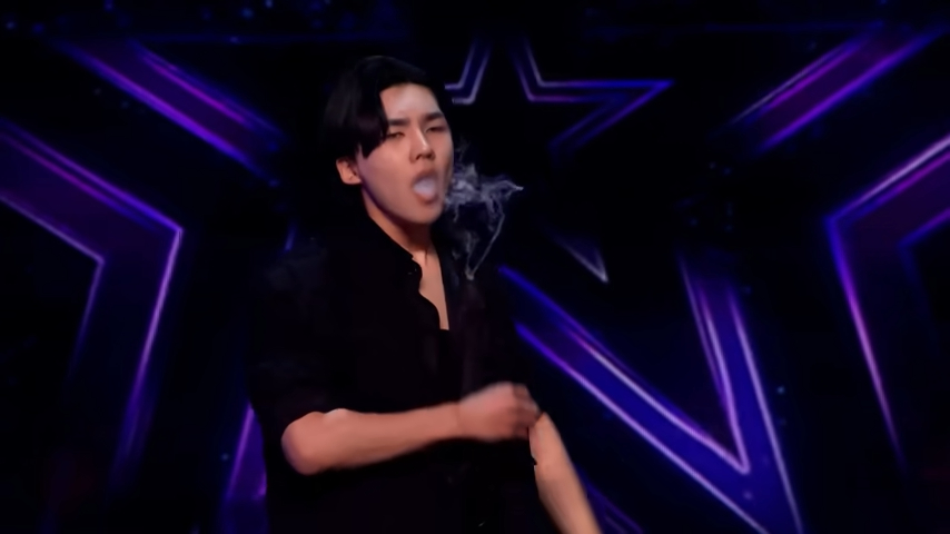 Eden Choi on Britain's Got Talent exhaling smoke.
