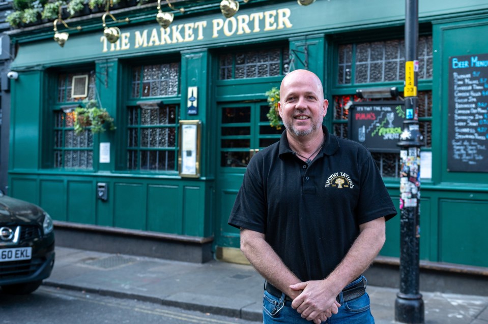 The landlord of The Market Porter pub in Borough Market, London.