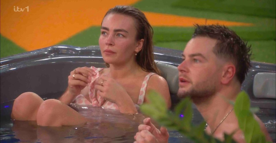 Ella Rae Wise and Chris Hughes in a hot tub.