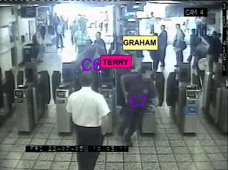 CCTV footage of armed police officers entering a subway station.