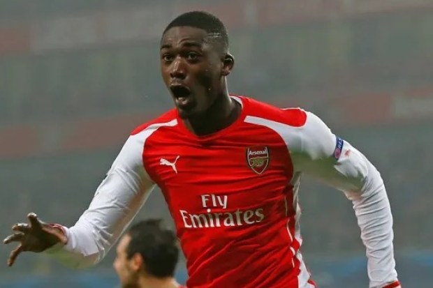 LONDON, ENGLAND - NOVEMBER 26:  Yaya Sanogo of Arsenal celebrates after scoring the opening goal during the UEFA Champions League Group D match between Arsenal and Borussia Dortmund at the Emirates Stadium on November 26, 2014 in London, United Kingdom.  (Photo by Clive Rose/Getty Images)