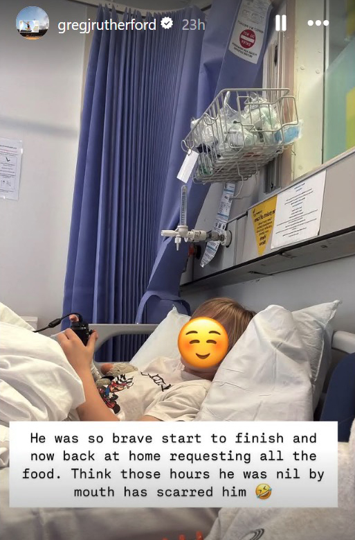 Child in hospital bed after surgery.