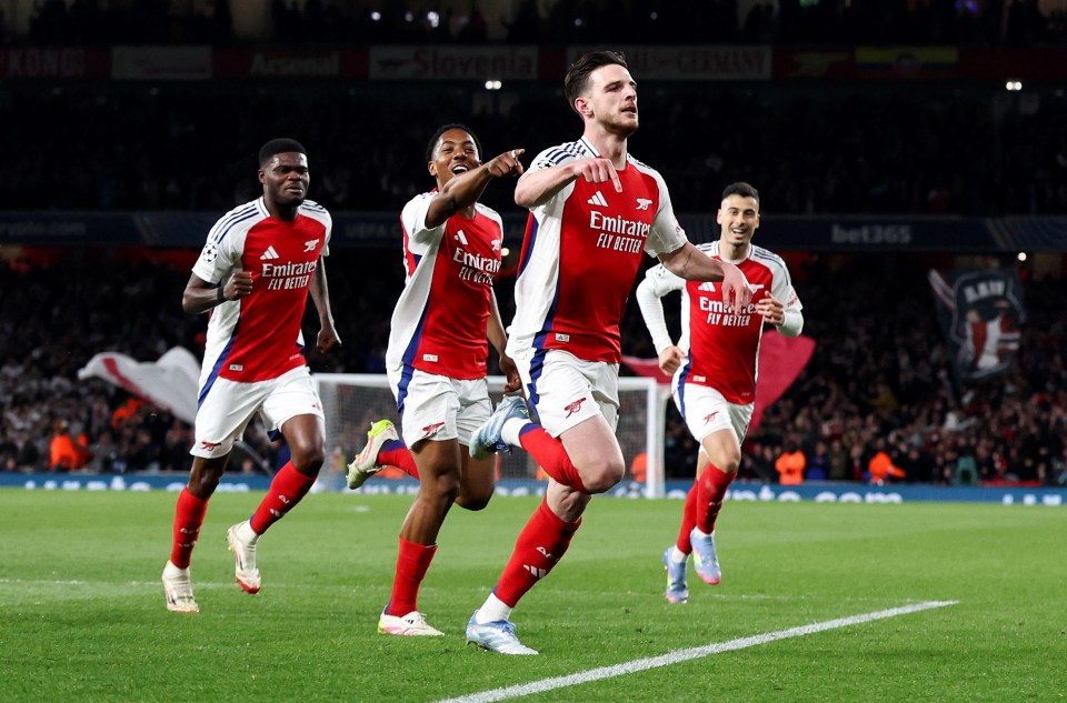 Arsenal players celebrating a goal.