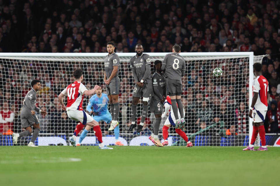 Declan Rice scoring a goal for Arsenal during a soccer match.