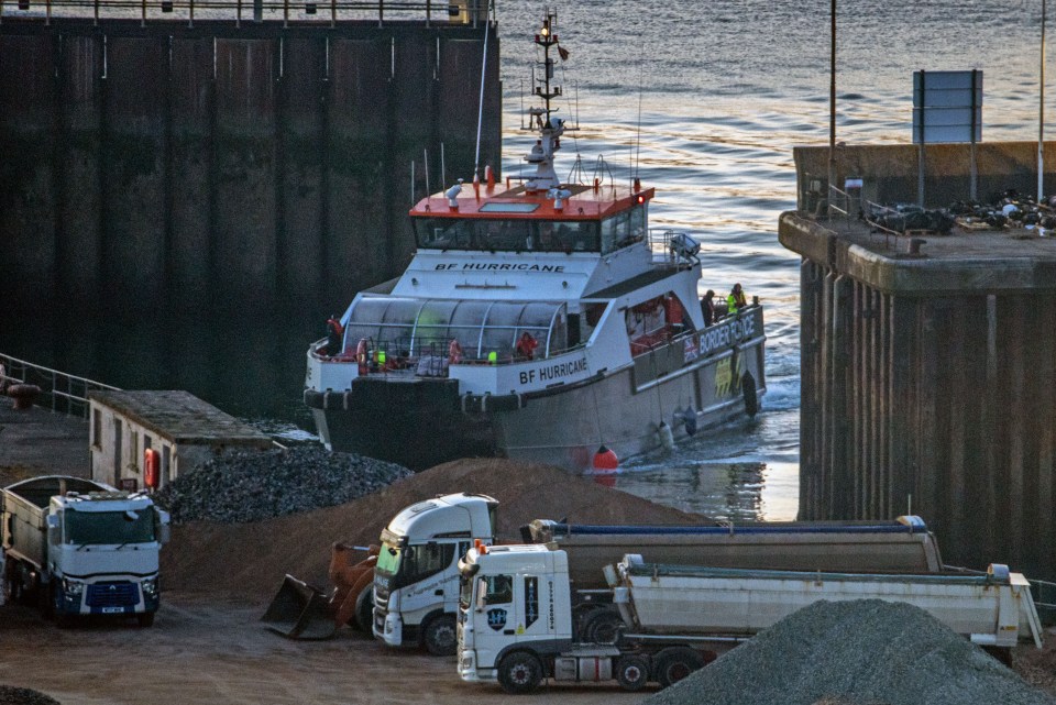 Border Force vessel BF Hurricane arriving at Dover docks with migrants.