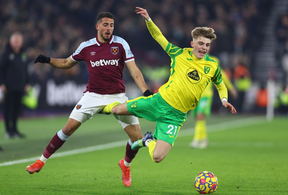 Soccer player Brandon Williams of Norwich City challenged by Pablo Fornals of West Ham United.