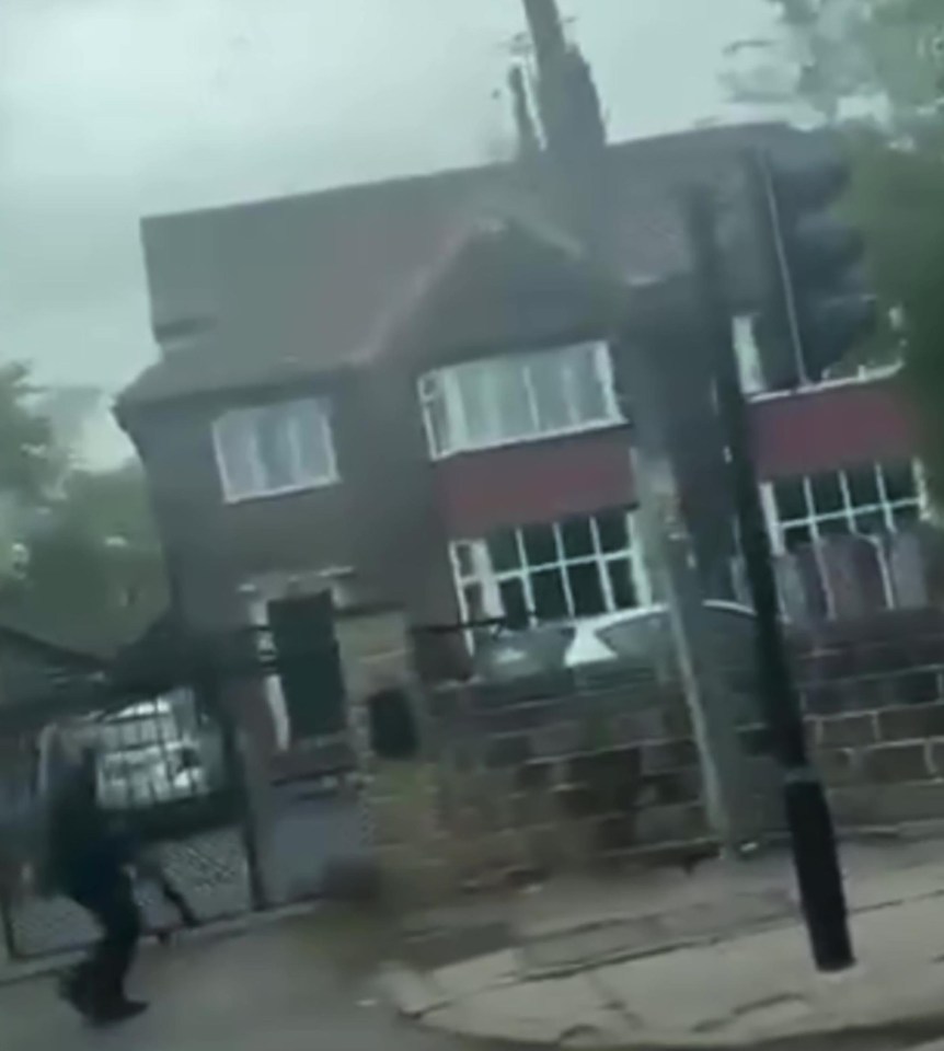 Chilling moment 'crossbow attacker' seen wielding weapons through streets of Leeds as three injured in broad daylight