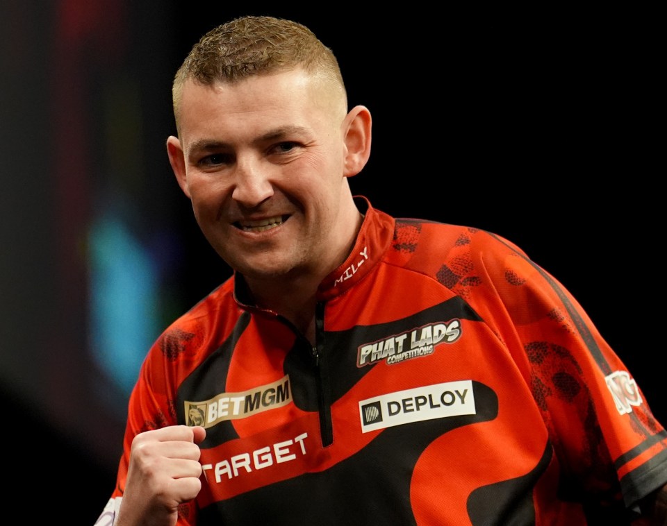 Nathan Aspinall celebrates winning a leg against Rob Cross during night ten of the BetMGM Premier League at the AO Arena, Manchester. Picture date: Thursday April 10, 2025. PA Photo. See PA story DARTS Manchester. Photo credit should read: Martin Rickett/PA Wire. RESTRICTIONS: Use subject to restrictions. Editorial use only, no commercial use without prior consent from rights holder.