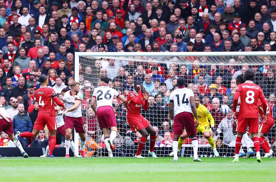 Liverpool's Virgil van Dijk scoring a goal against West Ham United.
