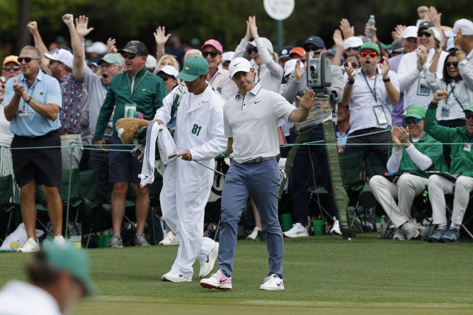Rory McIlroy acknowledges the crowd after making an eagle on the second green.