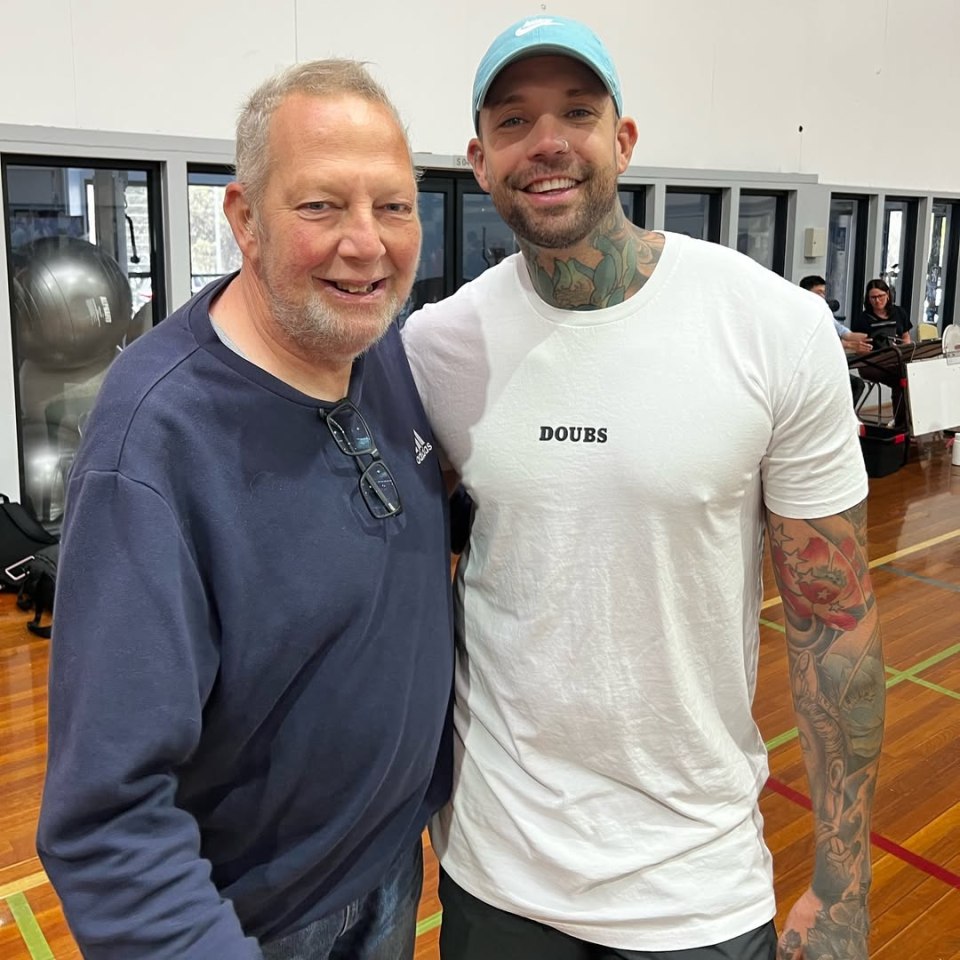 Photo of Dave Hand with another man.
