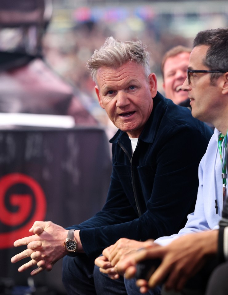 Gordon Ramsay watching a boxing match.