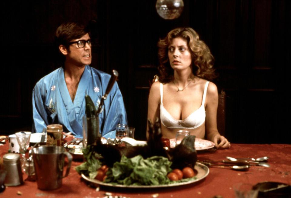 Scene from The Rocky Horror Picture Show: Barry Bostwick and Susan Sarandon at a dinner table.