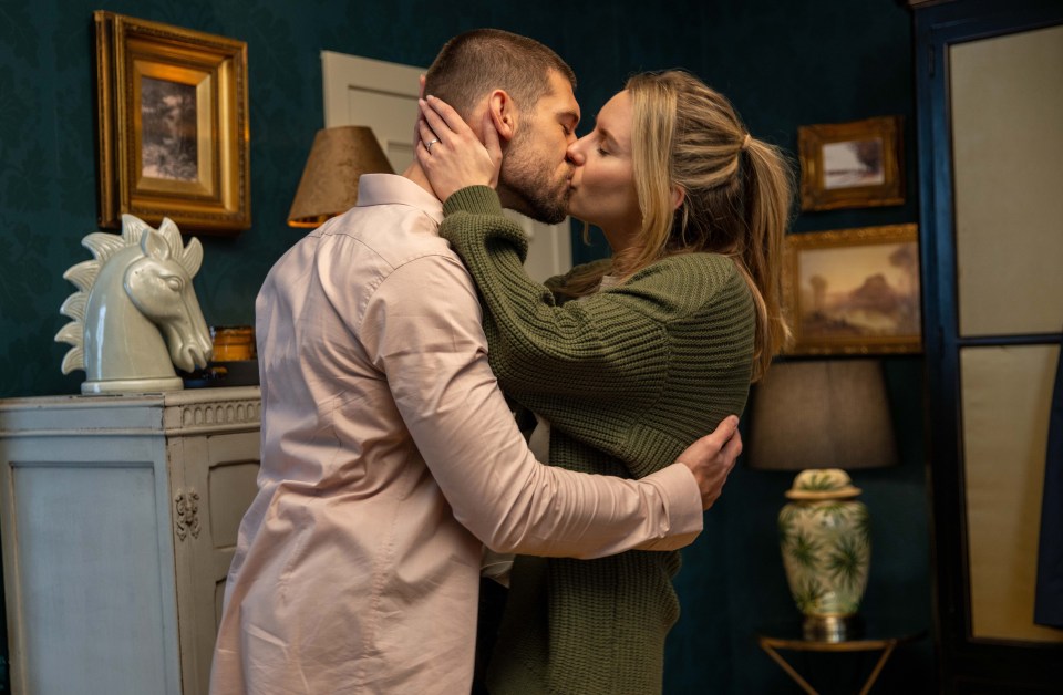 A man and woman kissing passionately.
