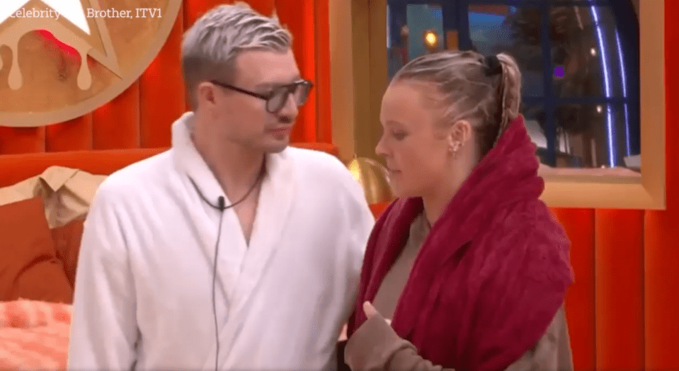 Two people in bathrobes talking.