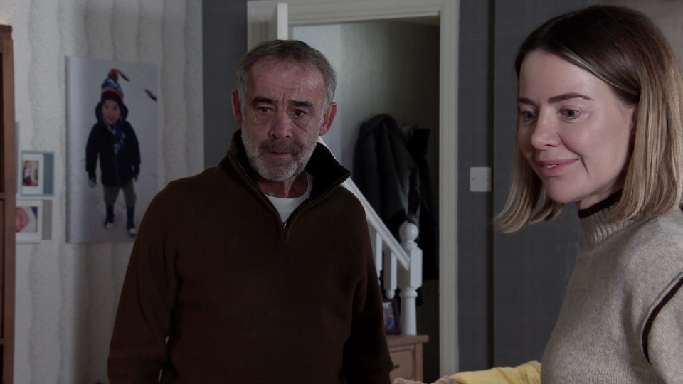 Still image from Coronation Street showing Kevin Webster and Abi Webster in a kitchen.