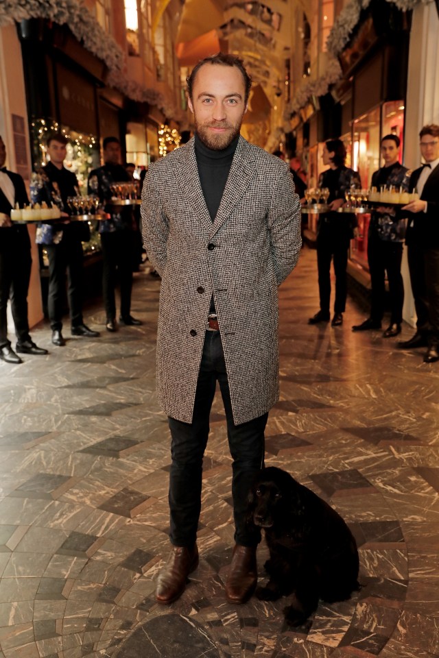 James William Middleton at a Christmas event with his dog.