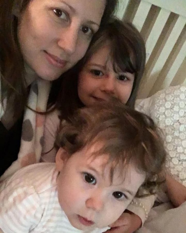 A mother with her two daughters.